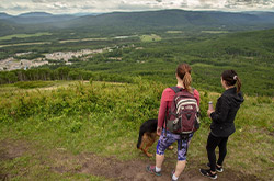 Two women hiking with large dog in Chetwynd